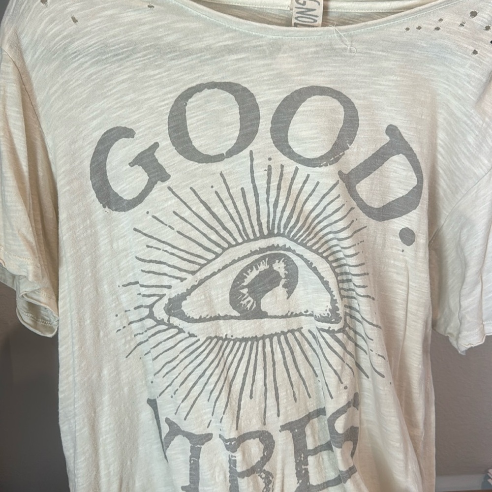 Cream Magnolia Pearl distressed tee